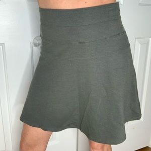 Athleta dark green skirt with back picket. Size 0